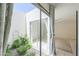 Private courtyard with plants, gravel, and large sliding glass doors at 1131 N Cherry --, Mesa, AZ 85201