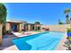 Private backyard features a sparkling pool, patio area, and lush greenery, perfect for enjoying outdoor living at 1131 N Cherry --, Mesa, AZ 85201