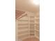Bright, spacious walk-in closet features built-in shelving and ample storage space at 1131 N Cherry --, Mesa, AZ 85201
