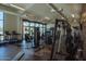 Brightly lit gym with modern exercise equipment and large windows at 1183 S Tumbleweed Ln, Chandler, AZ 85286