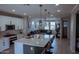 Open concept with kitchen island, dining area and living room at 1183 S Tumbleweed Ln, Chandler, AZ 85286