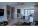 Spacious open-concept living area with stairs and kitchen island at 1183 S Tumbleweed Ln, Chandler, AZ 85286