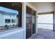 This patio has a railing, plenty of space, and a sliding glass door to the inside at 1183 S Tumbleweed Ln, Chandler, AZ 85286