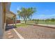 This backyard has a paved area, grass, and landscaping, and a wonderful view! at 1236 S Boulder St # C, Gilbert, AZ 85296