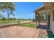 This backyard has a paved area, grass, and landscaping, and a wonderful view! at 1236 S Boulder St # C, Gilbert, AZ 85296