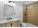 Updated bathroom with modern fixtures and a stylish wood accent wall at 1236 S Boulder St # C, Gilbert, AZ 85296