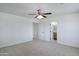 Bright bedroom with ceiling fan leading into bathroom and closet at 1236 S Boulder St # C, Gilbert, AZ 85296