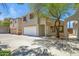 A charming two story home featuring an attached two car garage and mature landscaping at 1236 S Boulder St # C, Gilbert, AZ 85296