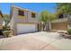 Two-story home with desert landscaping and an attached two car garage at 1236 S Boulder St # C, Gilbert, AZ 85296