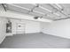 A bright and clean two car garage with a light gray epoxy floor at 1236 S Boulder St # C, Gilbert, AZ 85296