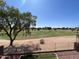 Enjoy the scenic golf course view from the lush, tree-lined backyard at 1236 S Boulder St # C, Gilbert, AZ 85296