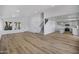 Open living room and staircase with neutral paint and vinyl flooring at 1236 S Boulder St # C, Gilbert, AZ 85296