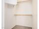 Walk-in closet with shelving and carpet flooring to efficiently organize your items at 125 N 22Nd Pl # 128, Mesa, AZ 85213
