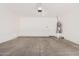 Spacious garage with concrete flooring provides ample storage and parking at 125 N 22Nd Pl # 128, Mesa, AZ 85213