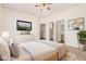 Relaxing main bedroom with ensuite bathroom, walk-in closet, and comfortable furnishings, offering a serene retreat at 125 N 22Nd Pl # 128, Mesa, AZ 85213