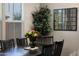 Dining room with seating for six with large windows and decor at 1255 N Arizona Ave # 1013, Chandler, AZ 85225