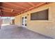 Covered back patio offers shade and access to the home's interior at 12602 N 38Th Ave, Phoenix, AZ 85029