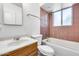 Standard bathroom featuring a sink, toilet, and tub with shower at 12602 N 38Th Ave, Phoenix, AZ 85029