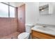 En-suite bathroom with shower, toilet, vanity and tile at 12602 N 38Th Ave, Phoenix, AZ 85029