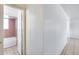 This bathroom has a tub with tile surround and a window for natural light at 12602 N 38Th Ave, Phoenix, AZ 85029