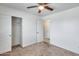 Bedroom featuring carpet, ceiling fan, closet and neutral wall color at 12602 N 38Th Ave, Phoenix, AZ 85029