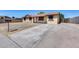 A single-story home showcasing a neatly paved driveway at 12602 N 38Th Ave, Phoenix, AZ 85029