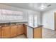 Kitchen with a sink, counter space, and access to the backyard through glass doors at 12602 N 38Th Ave, Phoenix, AZ 85029