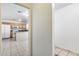 Bright kitchen with an island, tile floors, and white appliances at 12602 N 38Th Ave, Phoenix, AZ 85029