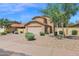 Two story home with a two car garage and mature landscaping at 12842 S Wakial Loop, Phoenix, AZ 85044