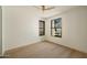 Spacious bedroom featuring wood flooring and natural light at 12887 N 135 St, Scottsdale, AZ 85259
