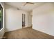 Bedroom with wood floors and scenic views with bathroom access at 12887 N 135 St, Scottsdale, AZ 85259