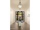 Grand foyer with a statement light fixture and exterior views at 12887 N 135 St, Scottsdale, AZ 85259