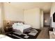 Lovely main bedroom with hardwood floors and a neutral color palette at 12887 N 135 St, Scottsdale, AZ 85259