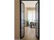 View of the home office from the hallway with hardwood floors at 12887 N 135 St, Scottsdale, AZ 85259