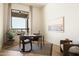 Bright home office with a large window and hardwood floors at 12887 N 135 St, Scottsdale, AZ 85259