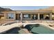 Inviting backyard pool with mountain views, natural landscaping, and patio at 12887 N 135 St, Scottsdale, AZ 85259
