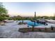 Beautiful backyard pool with desert landscaping and mountain views offers a serene and private retreat at 12887 N 135 St, Scottsdale, AZ 85259
