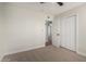Bedroom showing large closet, carpet and ceiling fan at 1352 W Naranja Ave, Mesa, AZ 85202