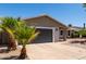 Exterior showcasing desert landscaping, front yard, and a well-manicured lawn at 1352 W Naranja Ave, Mesa, AZ 85202