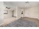 Spacious living room featuring light-colored walls and modern flooring at 1352 W Naranja Ave, Mesa, AZ 85202