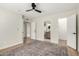 Large main bedroom that provides access to the en suite bathroom and walk-in closet at 1352 W Naranja Ave, Mesa, AZ 85202