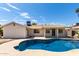 Backyard pool features patio and a well-maintained yard at 1352 W Naranja Ave, Mesa, AZ 85202