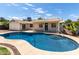 Inviting backyard with a private pool and patio, perfect for outdoor entertaining at 1352 W Naranja Ave, Mesa, AZ 85202