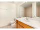 Clean bathroom with a single sink vanity, tile flooring, and mirrored wall cabinet at 1439 N 53Rd Ave, Phoenix, AZ 85043