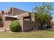 A multi-level home is complimented by desert landscaping in a meticulously maintained front yard at 1439 N 53Rd Ave, Phoenix, AZ 85043
