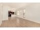 Bright living room with tile flooring, neutral walls, and an open layout to the kitchen at 1439 N 53Rd Ave, Phoenix, AZ 85043