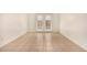 Empty room with tile flooring and french doors that provide natural light at 1439 N 53Rd Ave, Phoenix, AZ 85043