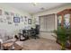 Office space with a desk, comfortable chair, large window, and natural light at 1628 E Aspen Ave, Buckeye, AZ 85326