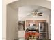 Cozy kitchen with stainless steel appliances and views to other rooms in the house at 16288 W Hadley St, Goodyear, AZ 85338