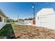 Backyard view of the pool, shed, and covered patio at 1712 N Old Colony --, Mesa, AZ 85201